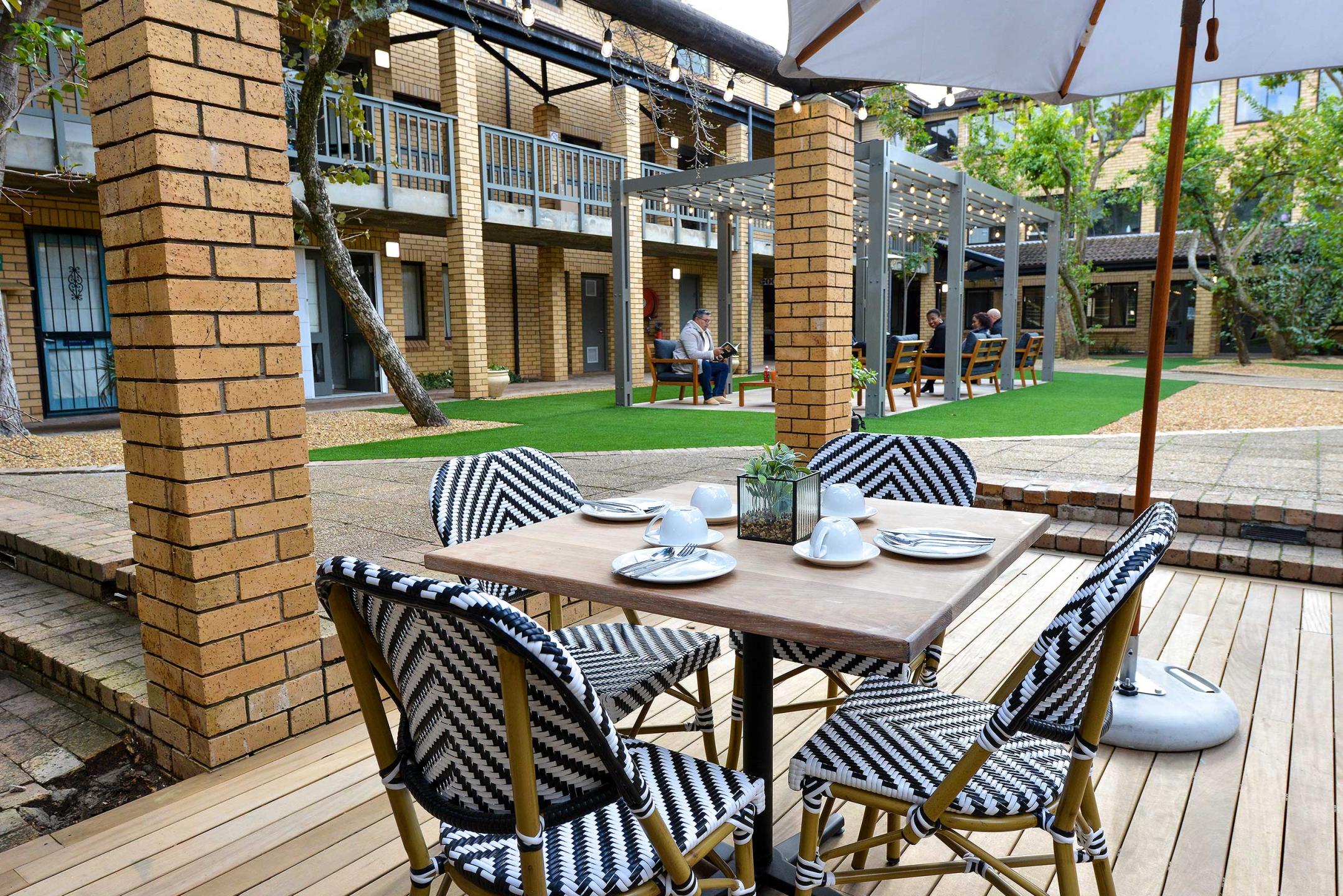 All Africa House: Courtyard , patio with chairs